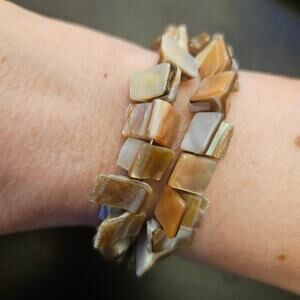 Tan iridescent shell nugget memory wire bracelet